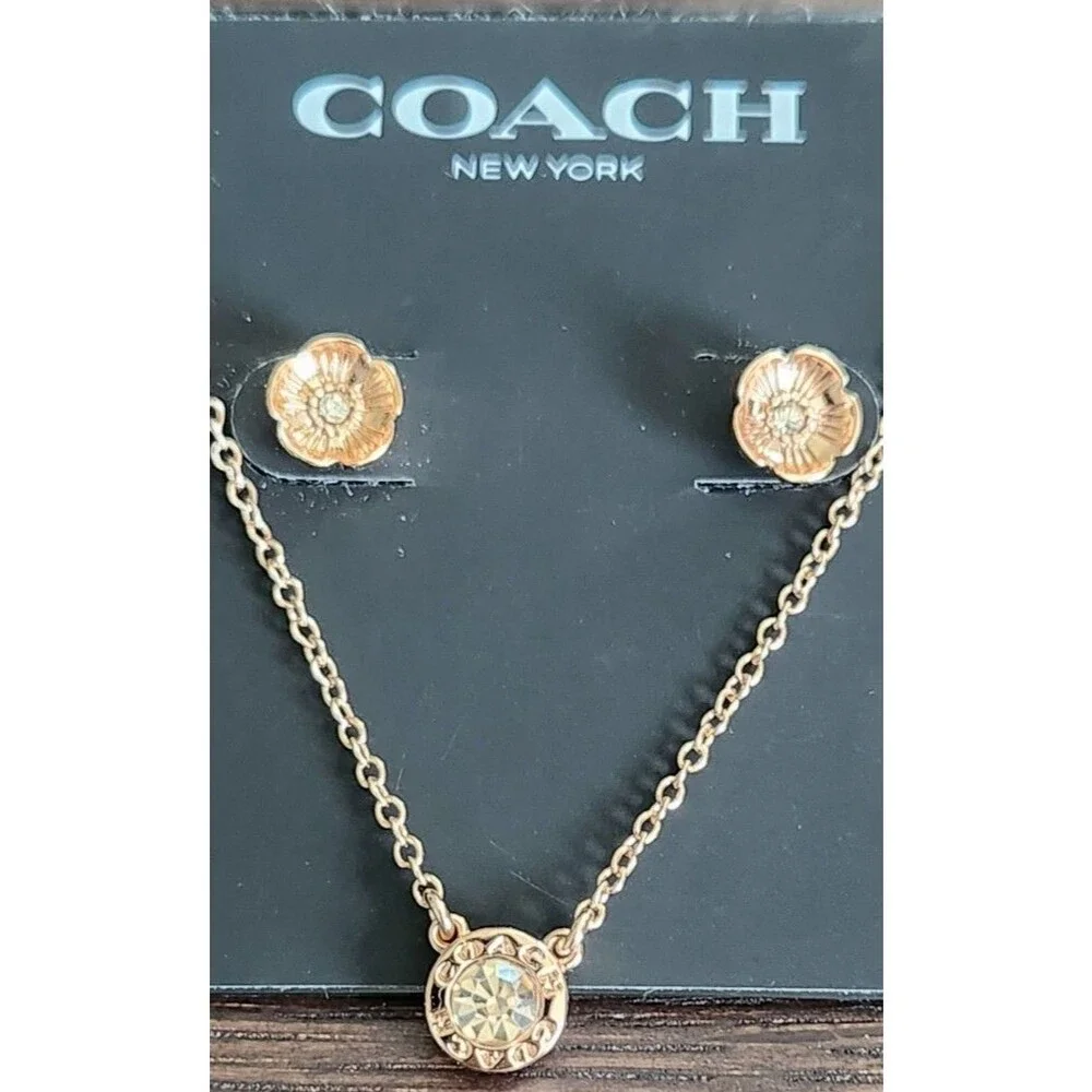 COACH Rose Gold Halo Necklace and Matching Flower Earring Set MSRP. $125